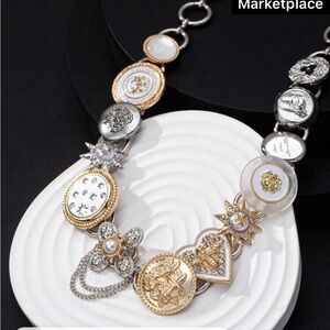 Elegant Gold and Silver Charm Necklace